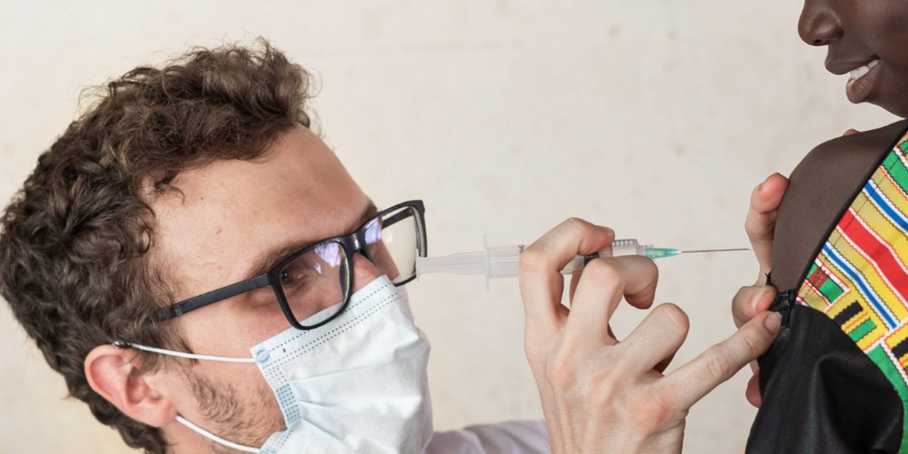 A doctor provides a vaccine, showing Astellas’ pursuit of collaborative research to discover new drugs for the treatment of Malaria.