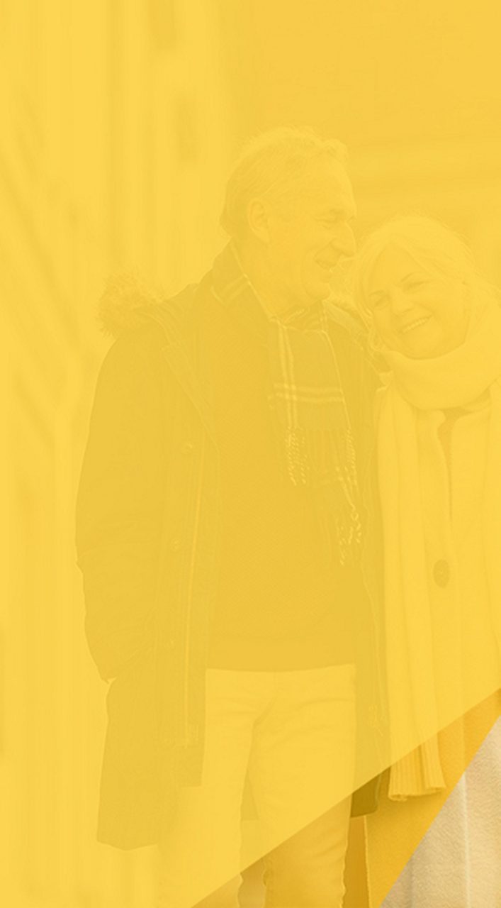 Bild med text om BETMIGA™ och ett par som står tillsammans i varma ytterkläder.