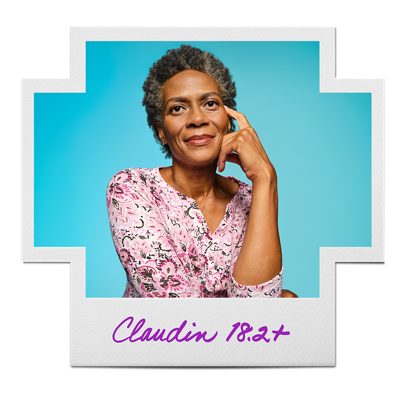 Woman in pink shirt inside a Claudin 18.2-positive frame.