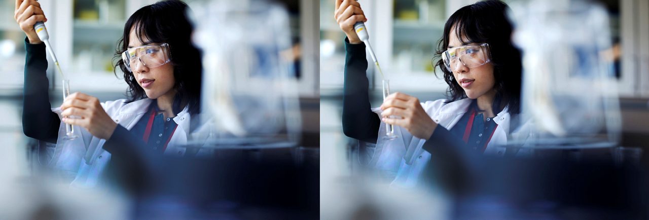 An Astellas scientist in a lab, illustrating the company’s philosophy to improve the health of people around the world. 