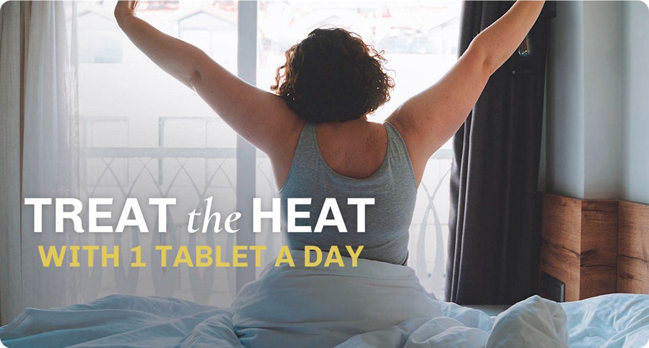 Woman waking up in her bed. Treat the heat  with 1 tablet a day