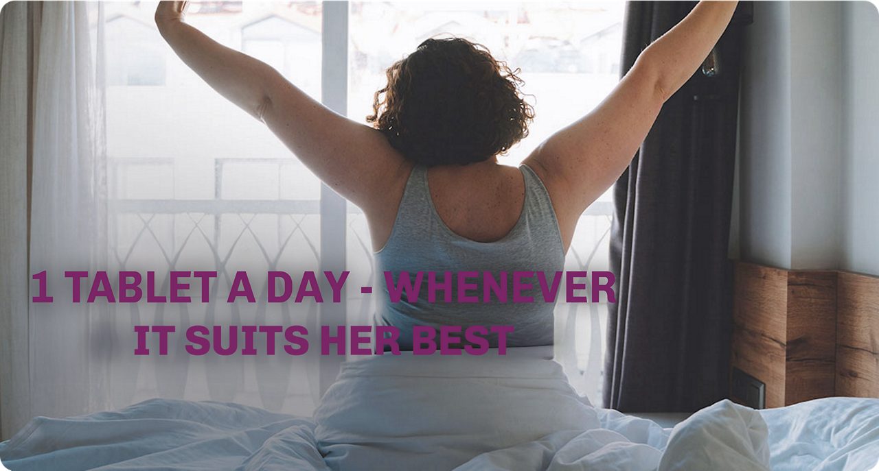 Woman waking up in her bed.  Treat the heat  with 1 tablet a day