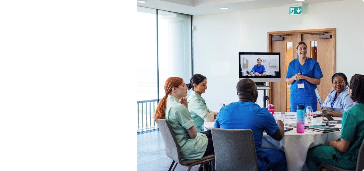 A group of healthcare professionals meet, reflecting Astellas’ commitment to funding independent medical education activities.