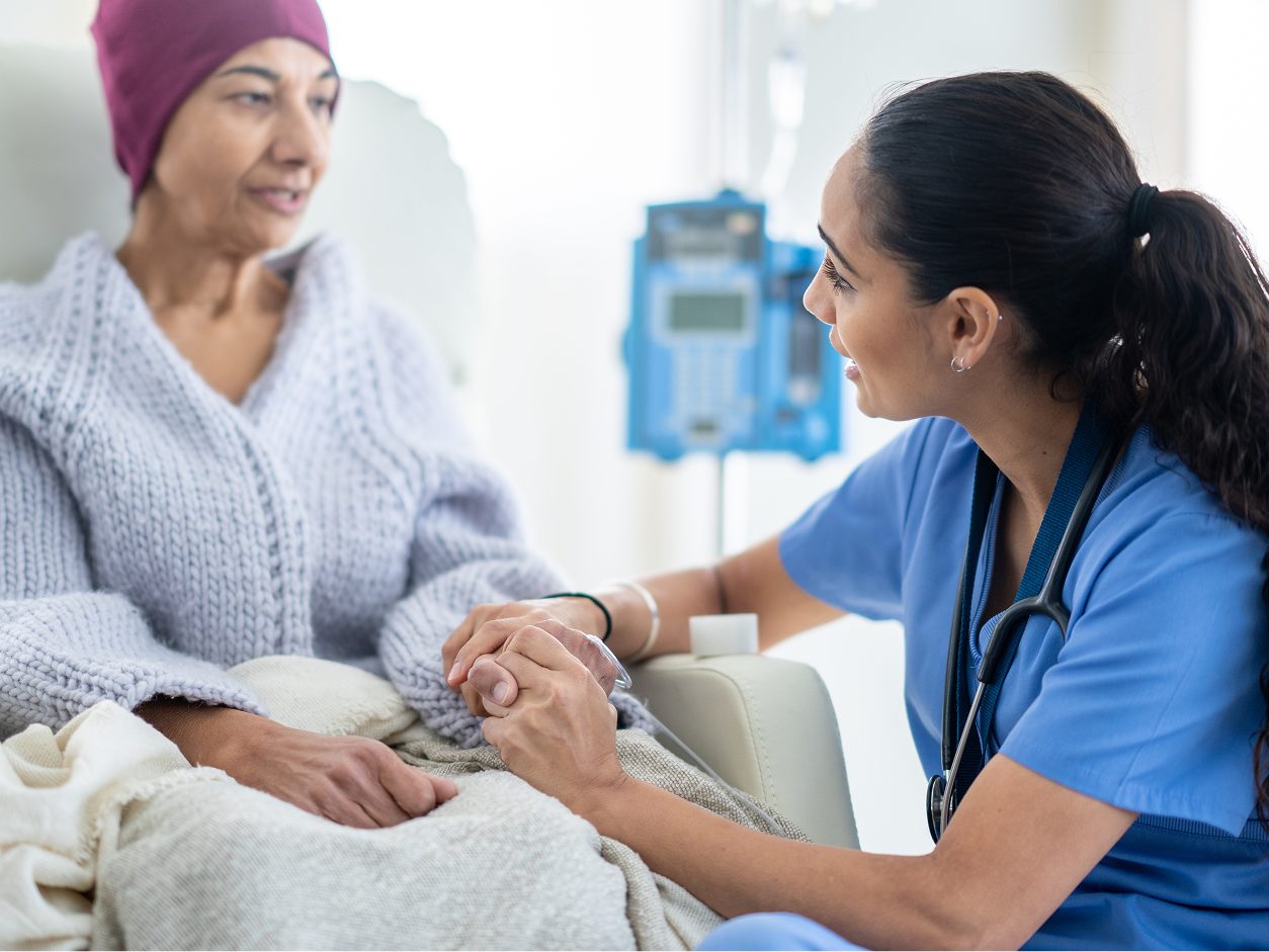 Two women embrace, expressing Astellas’ commitment to therapies that have transformed the lives of millions of patients.