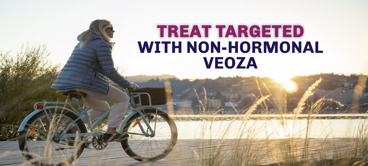 Woman looking out over a lake in a winter landscape. Treat the heat with nonhormonal VEOZA