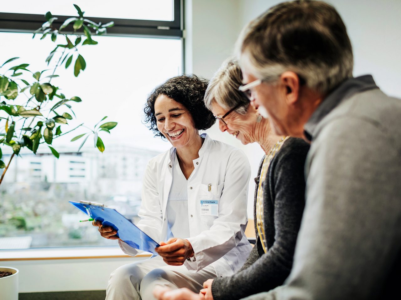 A doctor speaks with an older patient, illustrating the Astellas’ commitment to driving transformative therapies.