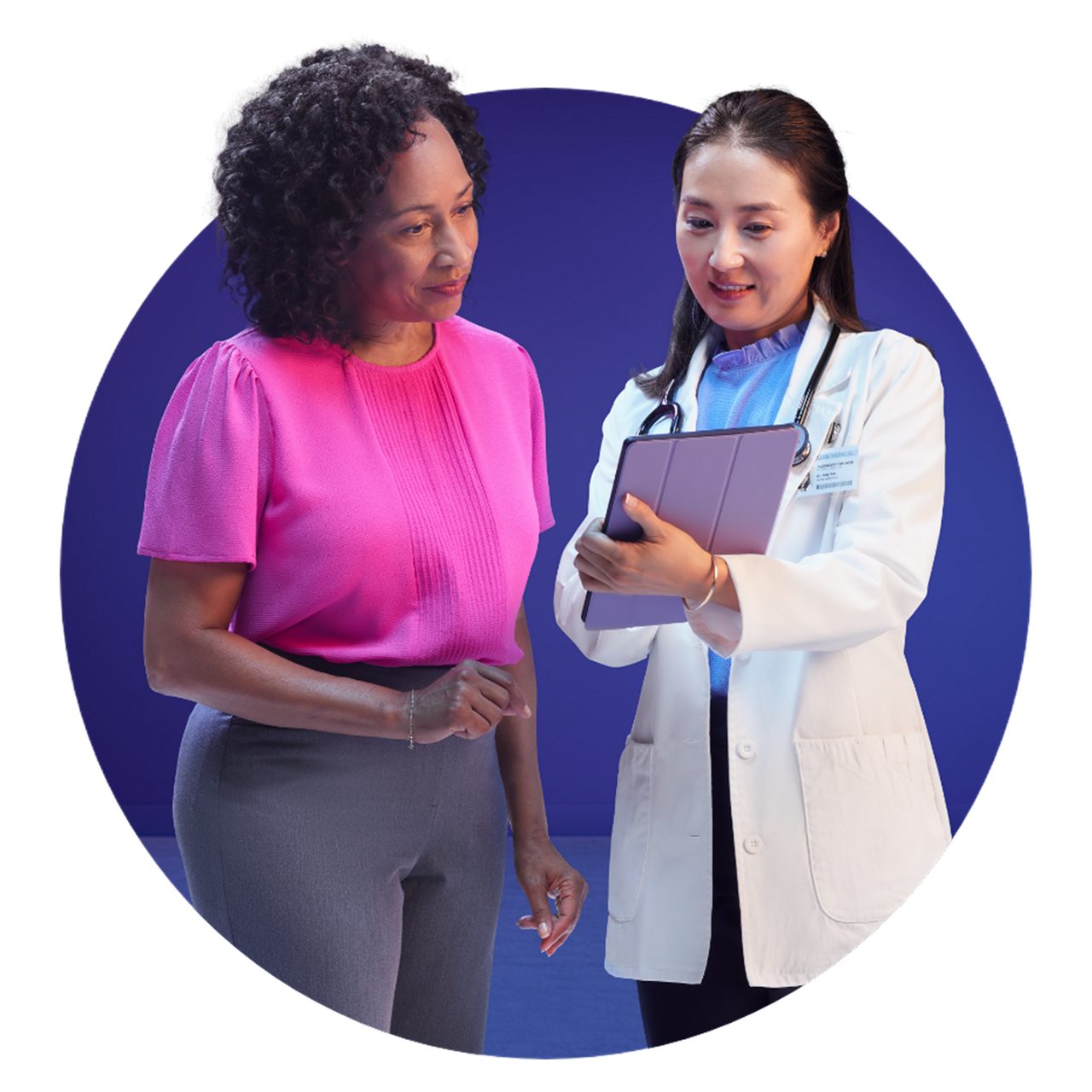 Patient and doctor looking at iPad