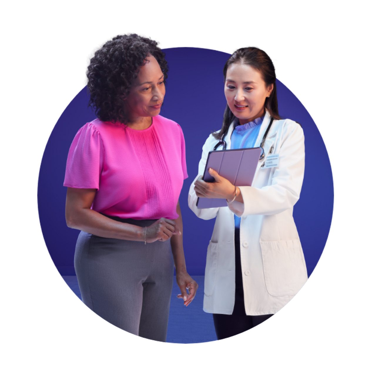 Patient and doctor looking at iPad