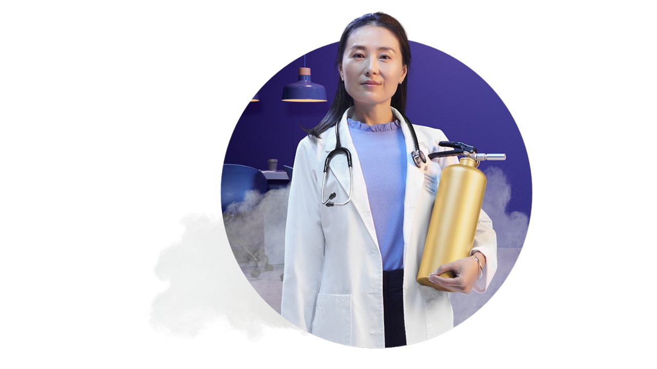 Doctor holding fire extinguisher with smoke behind her