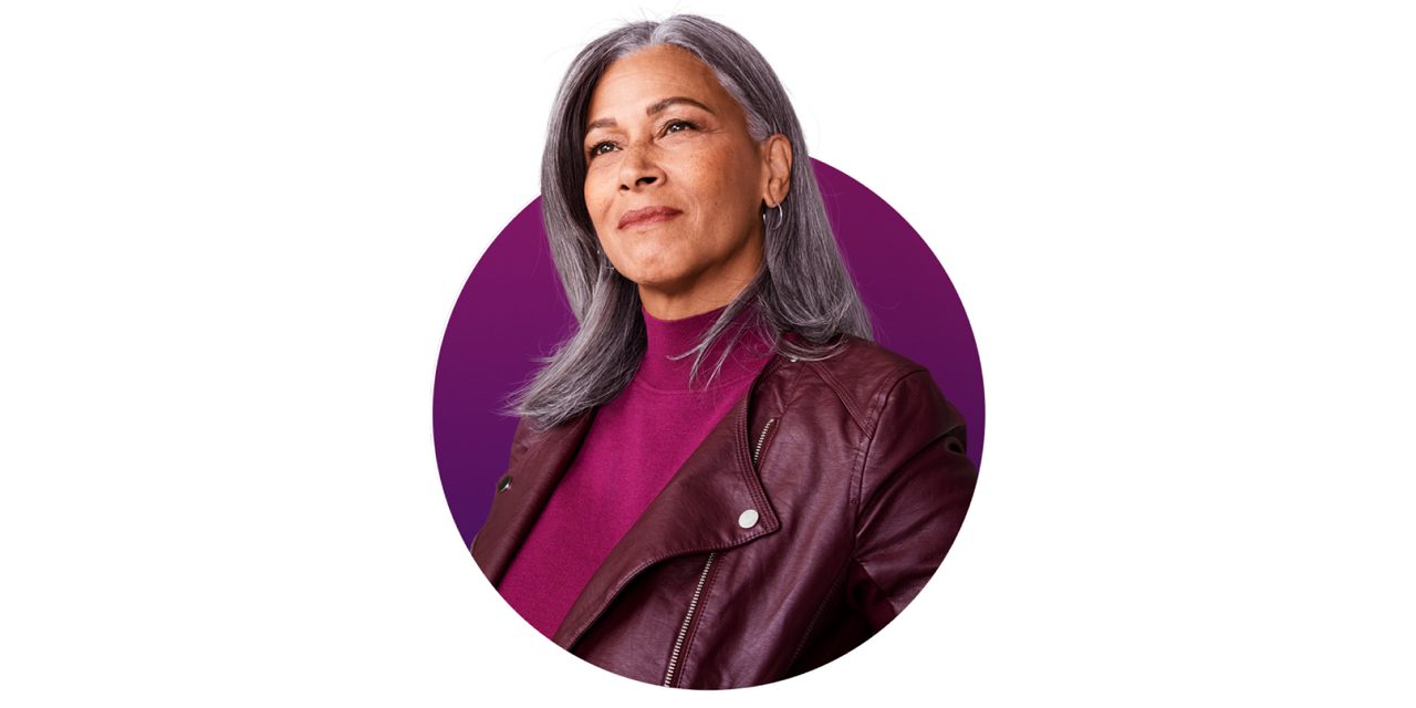 A woman wearing a leather jacket