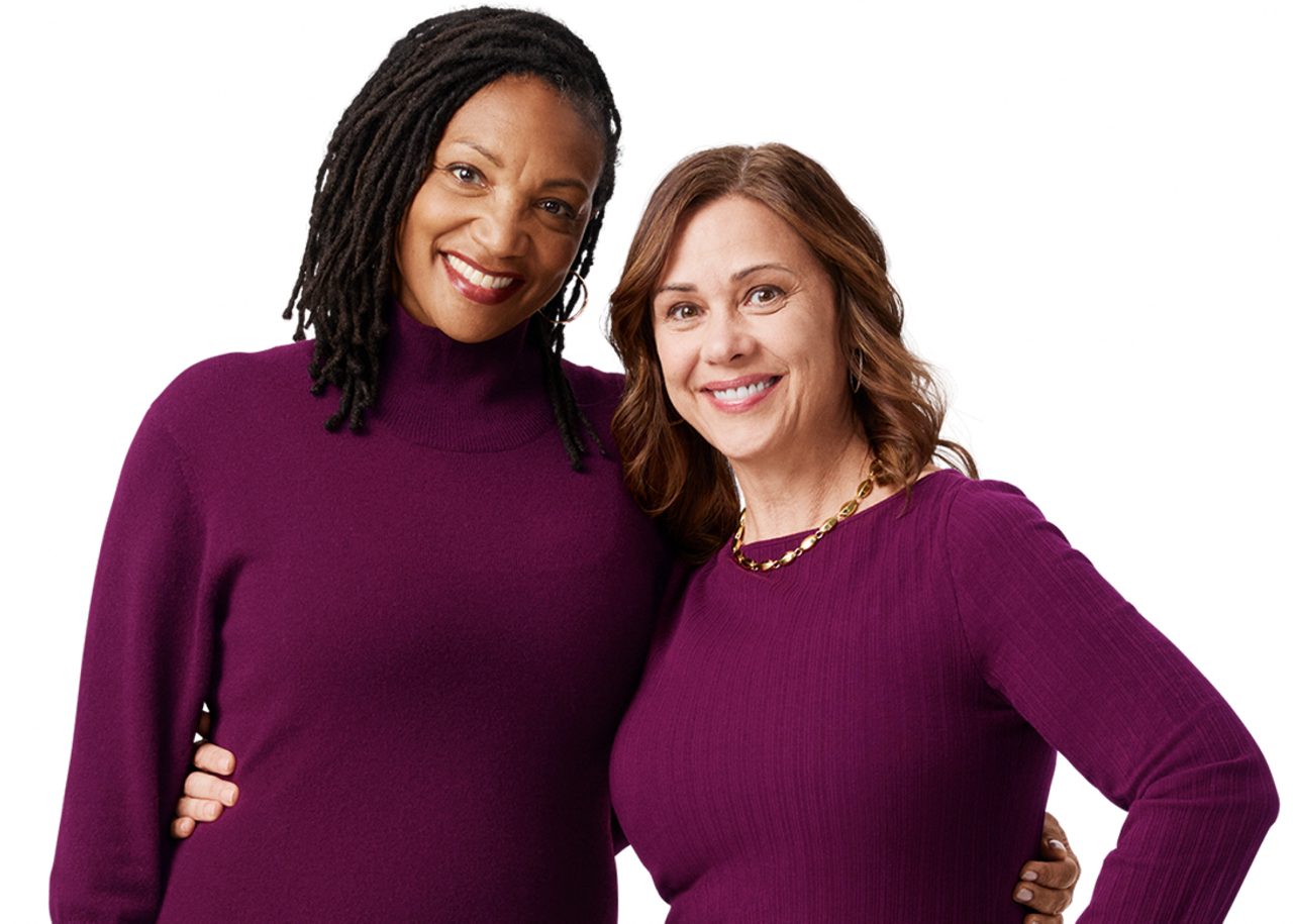 Two women standing together