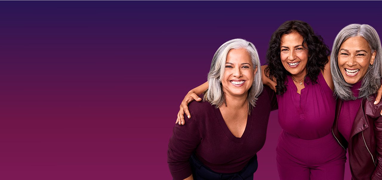 Three women embracing 