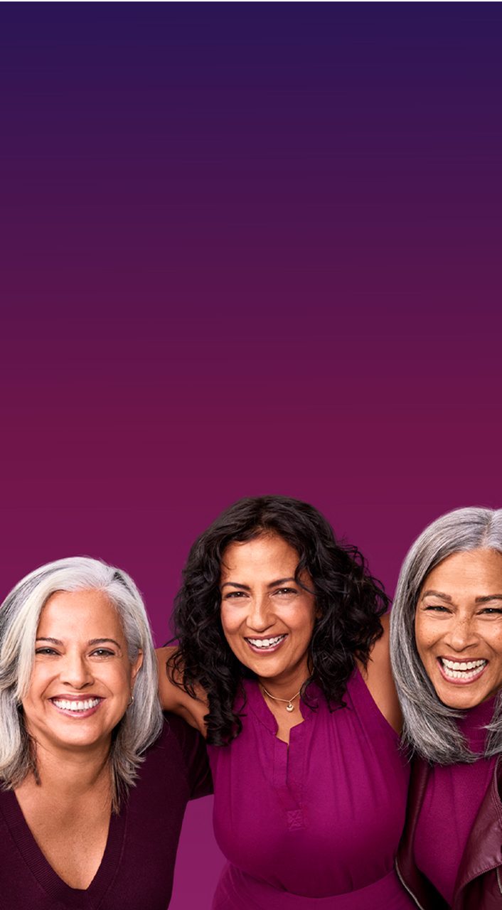 Three women embracing 