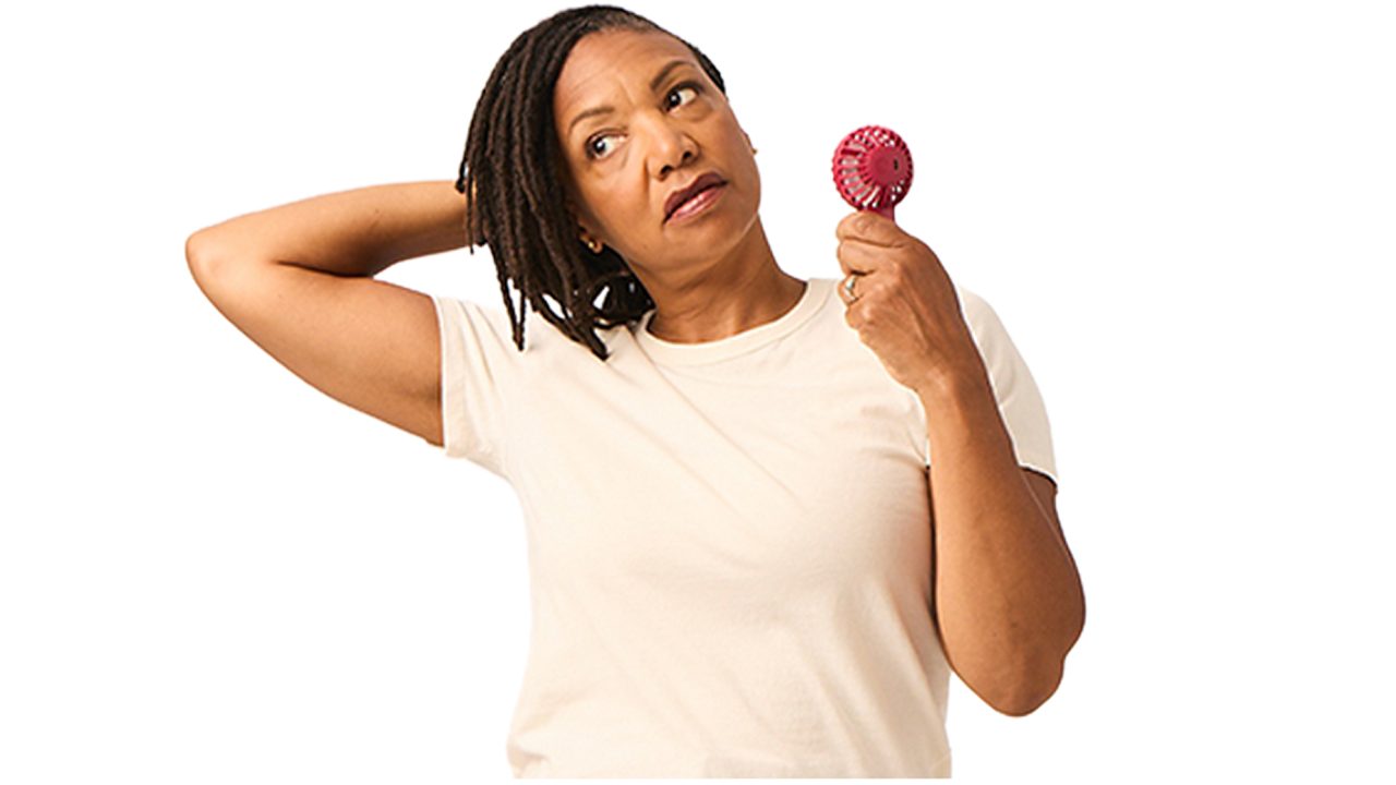 woman experiencing a hot flash