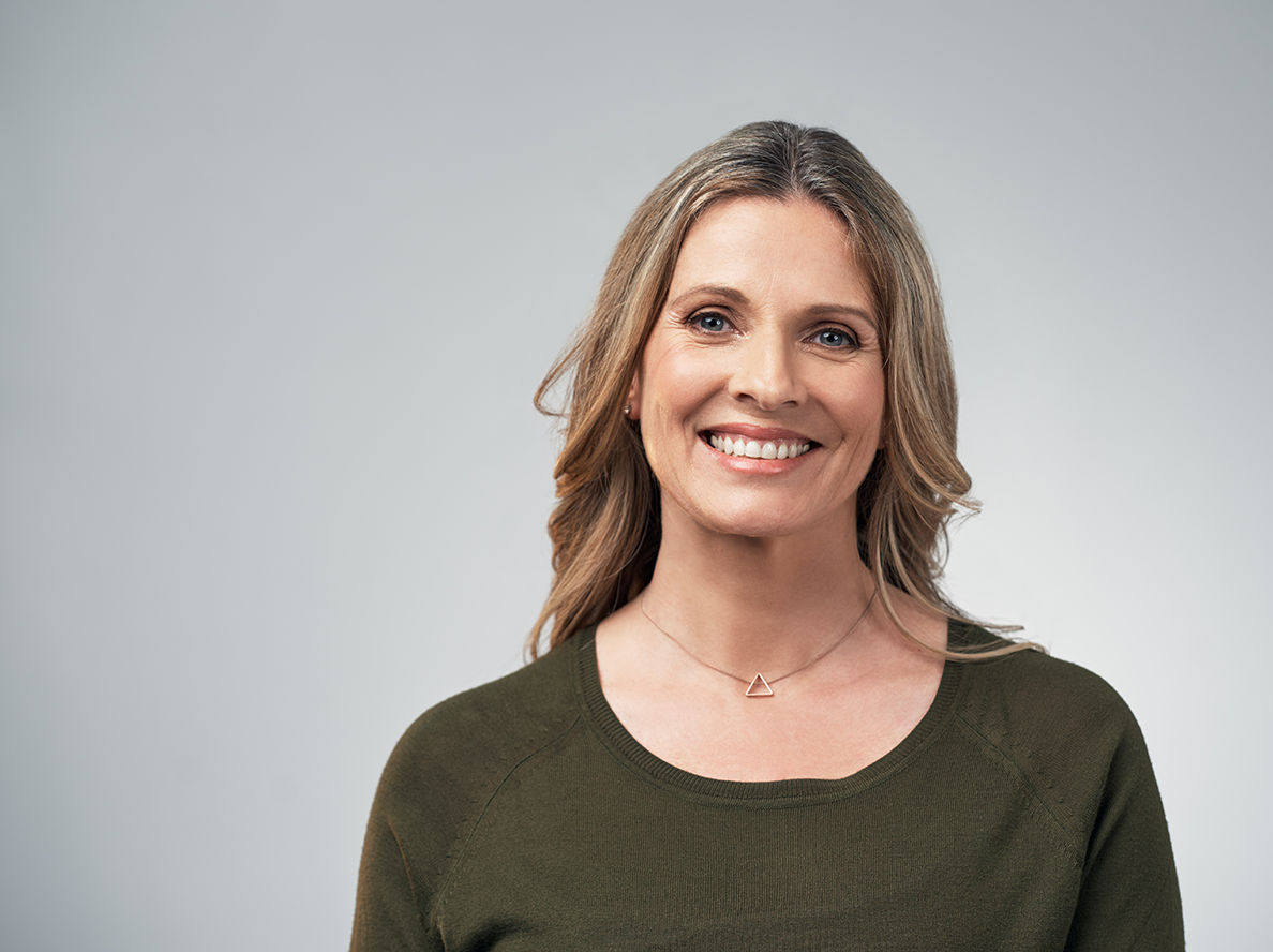 Woman smiling talking to group