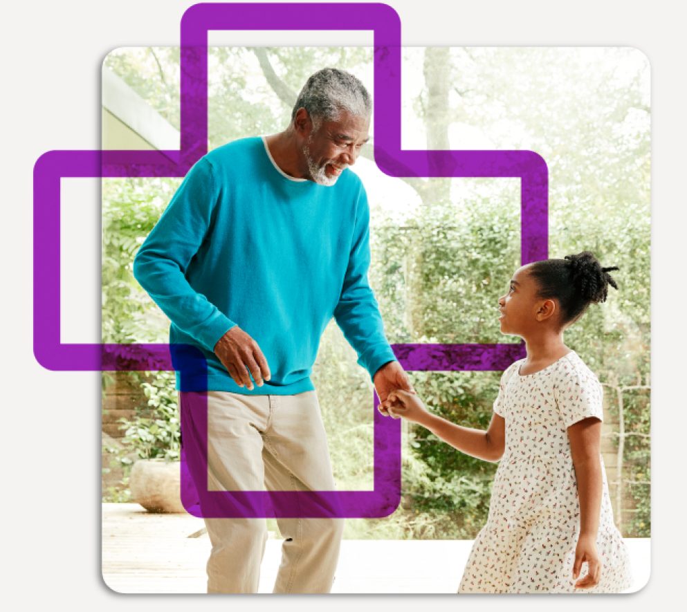 Grandfather and granddaughter holding hands