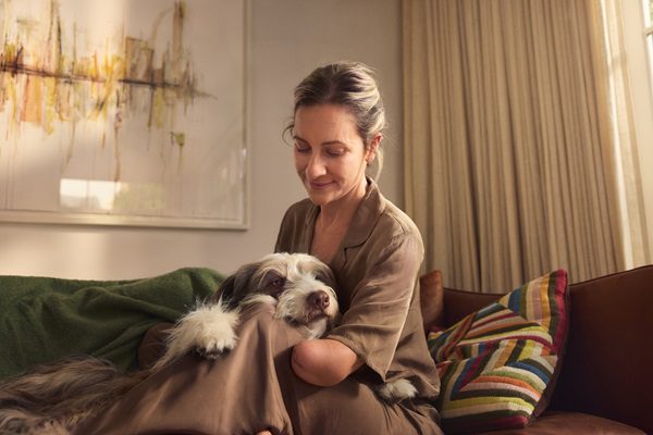 Woman smiling with dog