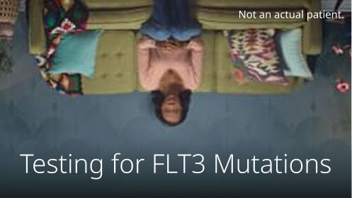 Upside down image of a woman on a couch.